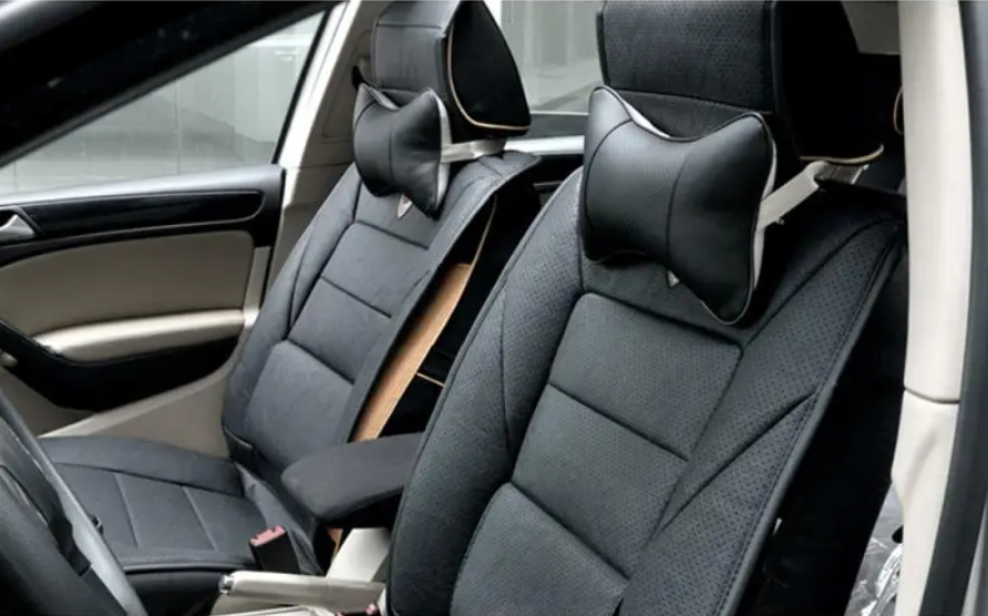 Almohadas universales de cuero Pu para el cuello del coche, reposacabezas para aliviar el dolor de cabeza, relleno de fibra, paquete de 1 piezas